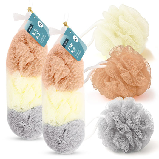 Set of bath pouf sponges in various colors with tags on a white background